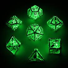 Skull's Grin Hollow Metal Dice Set - Glow in the Dark - Green