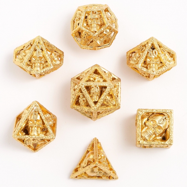 Skull's Grin Hollow Metal Dice Set - 24k Gold Plated